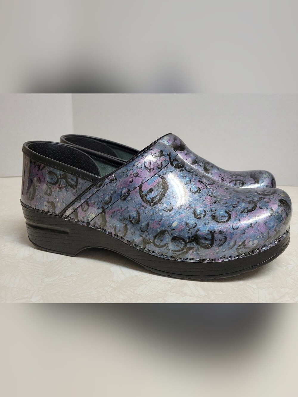 Dansko Metallic Blue-Purple Patterned Slip-On Clogs